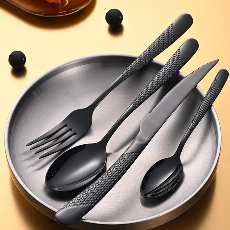 24pcs stainless steel tableware set, including knife, fork, spoon and coffee spoon gift box, dishwasher safe.